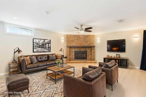 14904 1 Street Se, Calgary, AB - Indoor Photo Showing Living Room With Fireplace