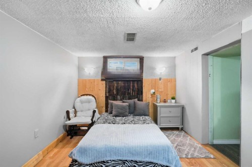 2145 24 Avenue, Didsbury, AB - Indoor Photo Showing Bedroom