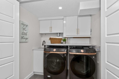 12031 Candiac Road Sw, Calgary, AB - Indoor Photo Showing Laundry Room