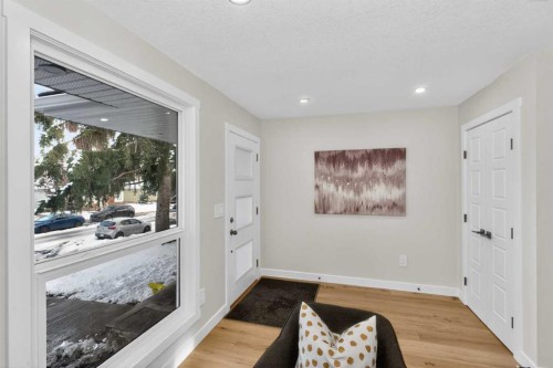 12031 Candiac Road Sw, Calgary, AB - Indoor With Fireplace
