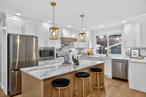 12031 Candiac Road Sw, Calgary, AB - Indoor Photo Showing Kitchen With Upgraded Kitchen