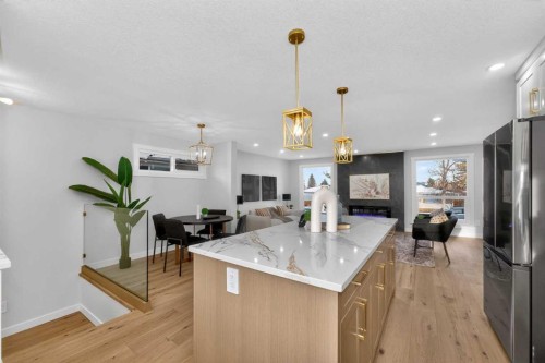 12031 Candiac Road Sw, Calgary, AB - Indoor Photo Showing Kitchen With Upgraded Kitchen