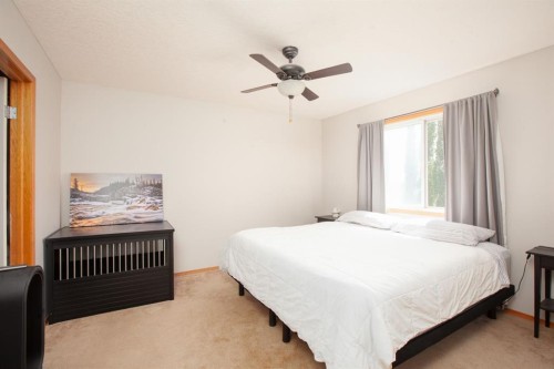 443 Tuscany Ridge Heights Nw, Calgary, AB - Indoor Photo Showing Bedroom