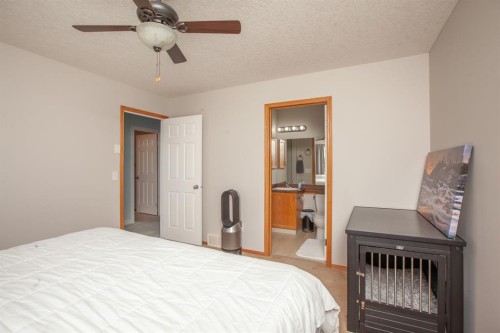 443 Tuscany Ridge Heights Nw, Calgary, AB - Indoor Photo Showing Bedroom