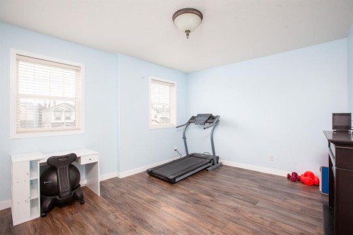 443 Tuscany Ridge Heights Nw, Calgary, AB - Indoor Photo Showing Gym Room