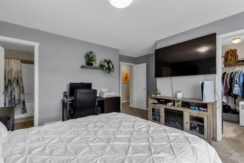 72 Copperpond Landing Se, Calgary, AB - Indoor Photo Showing Bedroom