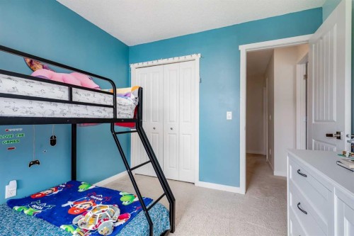 72 Copperpond Landing Se, Calgary, AB - Indoor Photo Showing Bedroom