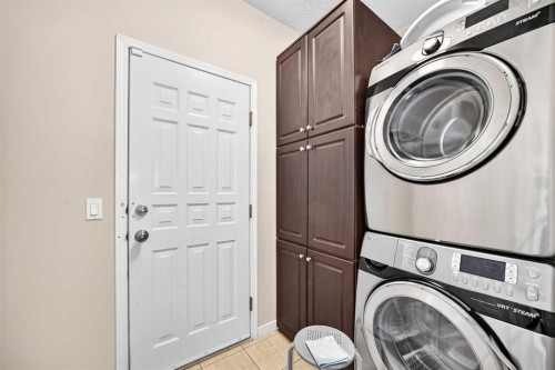 152 Chaparral Drive Se, Calgary, AB - Indoor Photo Showing Laundry Room