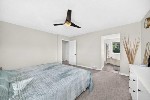 152 Chaparral Drive Se, Calgary, AB - Indoor Photo Showing Bedroom
