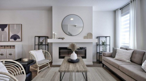 367 Wolf River Drive Se, Calgary, AB - Indoor Photo Showing Living Room With Fireplace