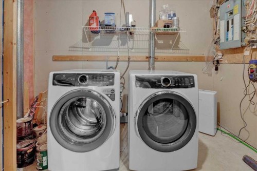 231 Tuscany Drive Nw, Calgary, AB - Indoor Photo Showing Laundry Room