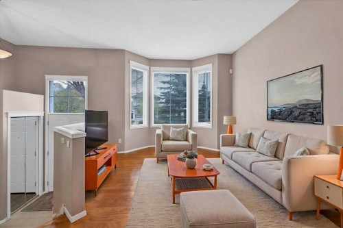 231 Tuscany Drive Nw, Calgary, AB - Indoor Photo Showing Living Room
