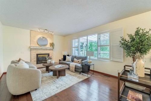 46 Mountain Park Drive Se, Calgary, AB - Indoor Photo Showing Living Room With Fireplace