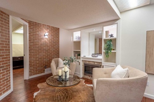 46 Mountain Park Drive Se, Calgary, AB - Indoor Photo Showing Living Room With Fireplace