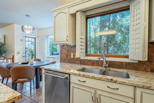 46 Mountain Park Drive Se, Calgary, AB - Indoor Photo Showing Kitchen With Double Sink