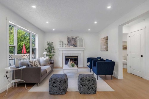 29 Douglas Glen Crescent Se, Calgary, AB - Indoor Photo Showing Living Room With Fireplace