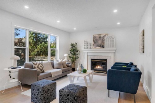 29 Douglas Glen Crescent Se, Calgary, AB - Indoor Photo Showing Living Room With Fireplace