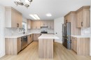 28 Coral Reef Link Ne, Calgary, AB  - Indoor Photo Showing Kitchen With Stainless Steel Kitchen With Upgraded Kitchen 