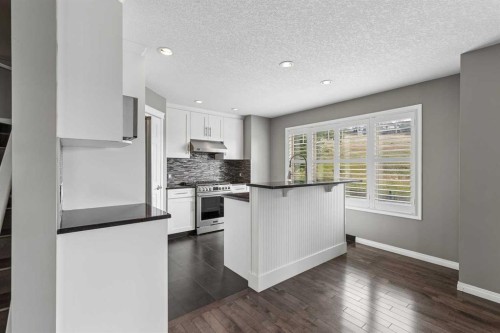 139 Hidden Creek Gardens Nw, Calgary, AB - Indoor Photo Showing Kitchen With Upgraded Kitchen