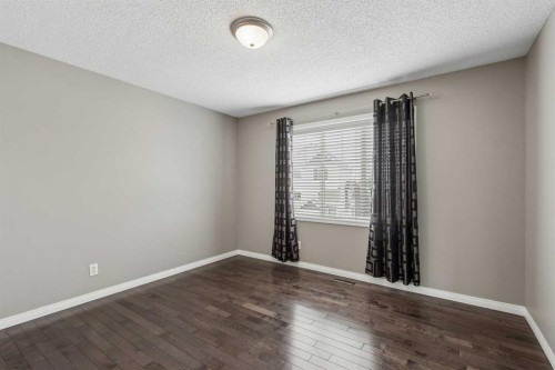 139 Hidden Creek Gardens Nw, Calgary, AB - Indoor Photo Showing Other Room
