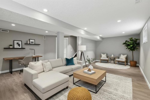 139 Hidden Creek Gardens Nw, Calgary, AB - Indoor Photo Showing Living Room
