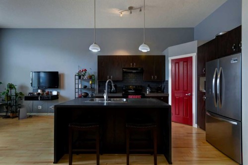 6 Elgin Meadows Road Se, Calgary, AB - Indoor Photo Showing Kitchen With Double Sink