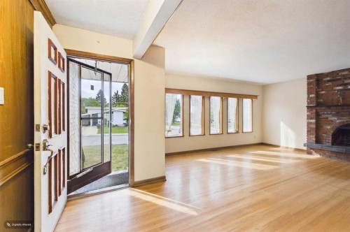 5 Chisholm Crescent Nw, Calgary, AB - Indoor With Fireplace