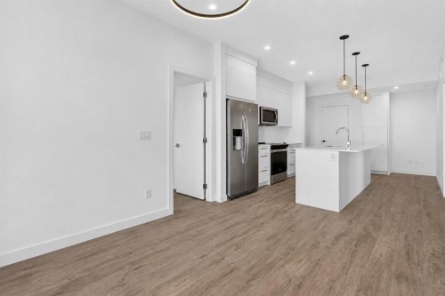 1522-265 Wolf Willow Boulevard Se, Calgary, AB - Indoor Photo Showing Kitchen With Upgraded Kitchen