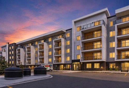 1522-265 Wolf Willow Boulevard Se, Calgary, AB - Outdoor With Balcony With Facade
