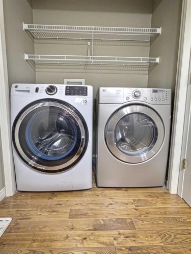 185 Tuscarora Close Nw, Calgary, AB - Indoor Photo Showing Laundry Room