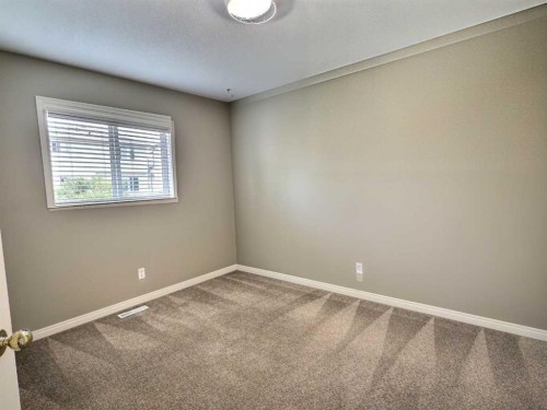 185 Tuscarora Close Nw, Calgary, AB - Indoor Photo Showing Other Room