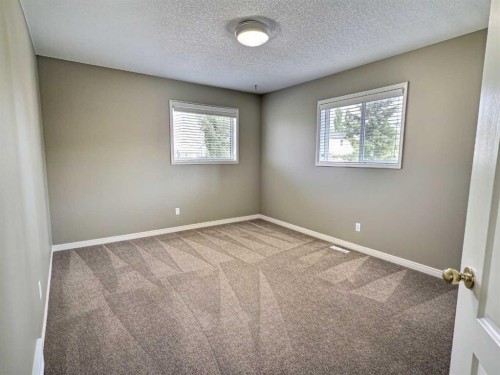 185 Tuscarora Close Nw, Calgary, AB - Indoor Photo Showing Other Room