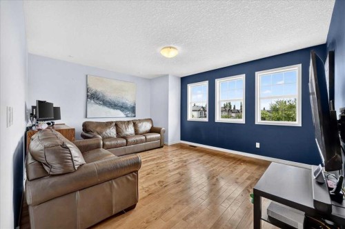 128 Cranberry Circle Se, Calgary, AB - Indoor Photo Showing Living Room