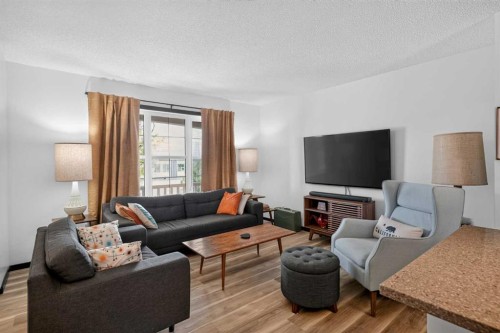 19 Marine Drive Se, Calgary, AB - Indoor Photo Showing Living Room