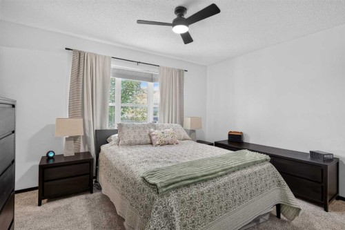 19 Marine Drive Se, Calgary, AB - Indoor Photo Showing Bedroom