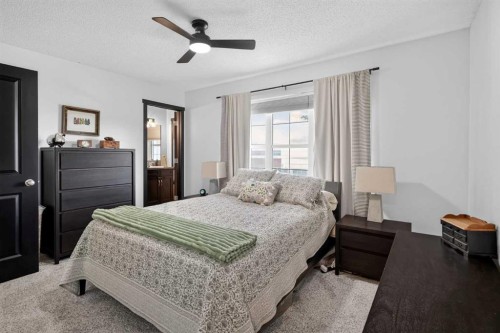 19 Marine Drive Se, Calgary, AB - Indoor Photo Showing Bedroom