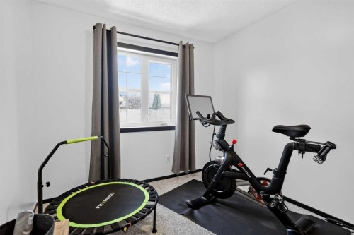 19 Marine Drive Se, Calgary, AB - Indoor Photo Showing Gym Room