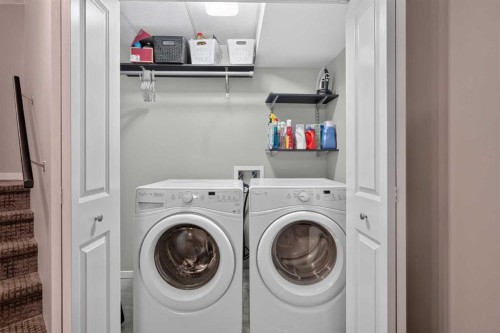 19 Marine Drive Se, Calgary, AB - Indoor Photo Showing Laundry Room