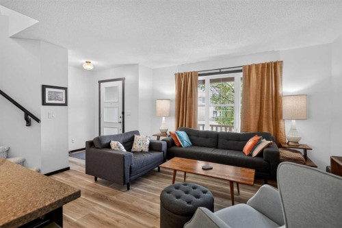 19 Marine Drive Se, Calgary, AB - Indoor Photo Showing Living Room