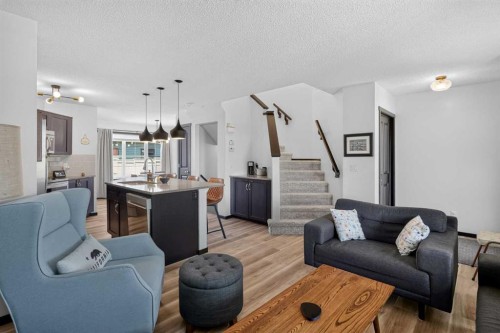 19 Marine Drive Se, Calgary, AB - Indoor Photo Showing Living Room