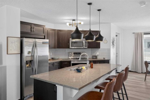 19 Marine Drive Se, Calgary, AB - Indoor Photo Showing Kitchen With Stainless Steel Kitchen With Upgraded Kitchen