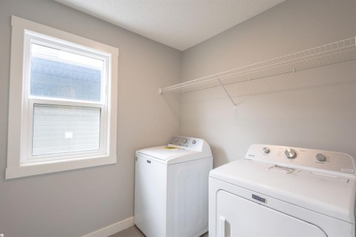 20588 Main Street Se, Calgary, AB - Indoor Photo Showing Laundry Room