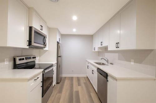 20588 Main Street Se, Calgary, AB - Indoor Photo Showing Kitchen With Stainless Steel Kitchen