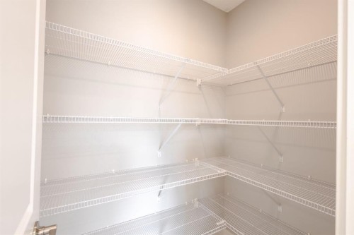 20588 Main Street Se, Calgary, AB - Indoor With Storage