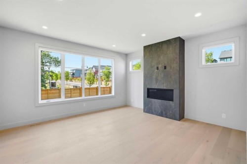 3 Mystic Ridge Way Sw, Calgary, AB - Indoor With Fireplace