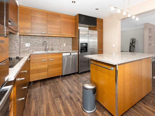 3782 Douglas Ridge Link Se, Calgary, AB - Indoor Photo Showing Kitchen With Stainless Steel Kitchen With Upgraded Kitchen