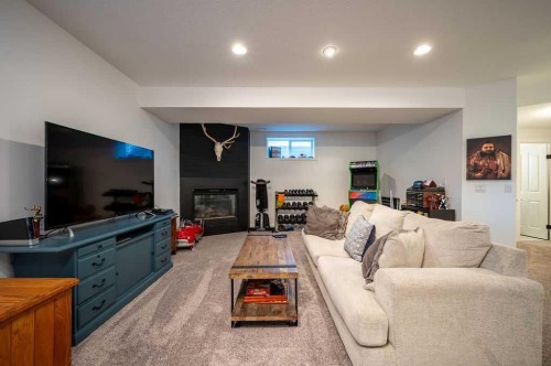 98 Chapala Grove Se, Calgary, AB - Indoor With Fireplace