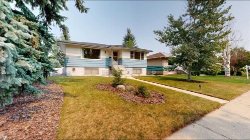 712 55 Avenue Sw, Calgary, AB - Outdoor