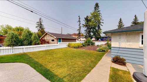 712 55 Avenue Sw, Calgary, AB - Outdoor