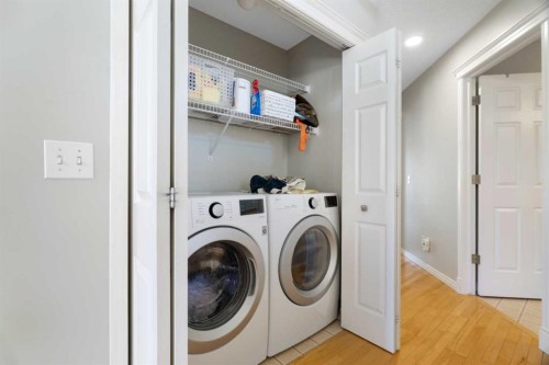 71 Scotia Landing Nw, Calgary, AB - Indoor Photo Showing Laundry Room
